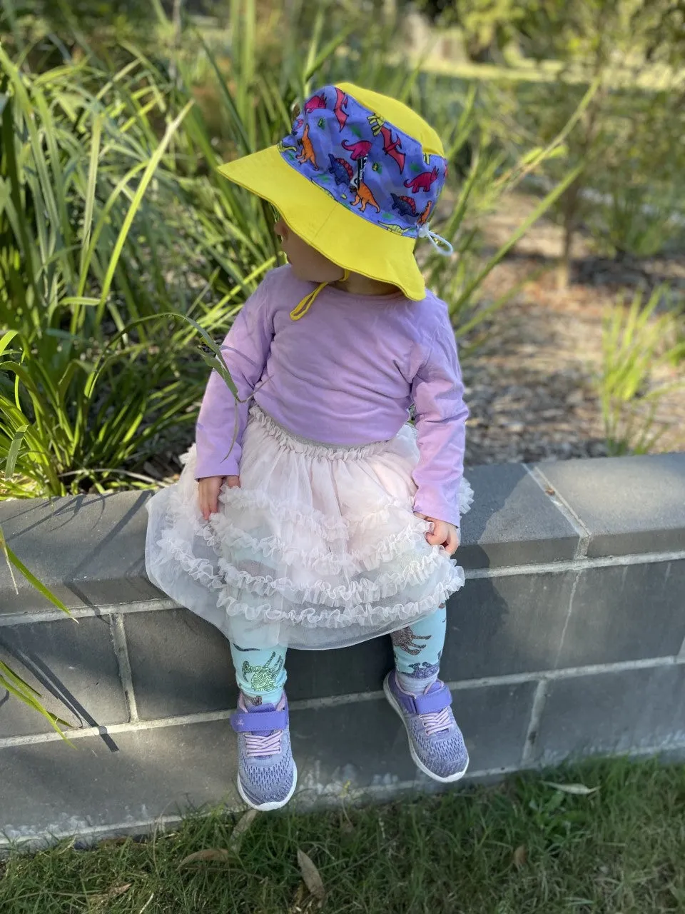 Sunsafe hat (yellow and purple) - Daring Dinosaurs